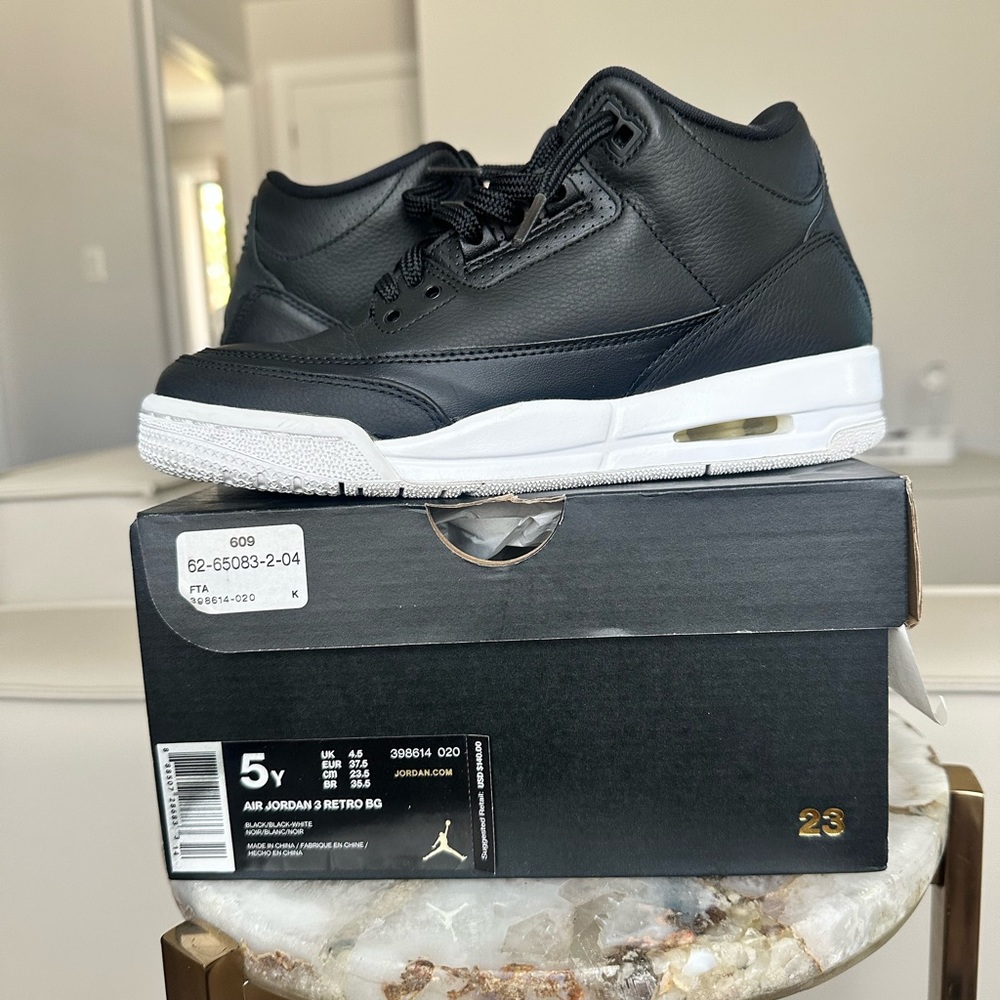 Black and white retro Jordan 3s